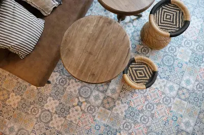 a wooden table and two baskets on a floor at MYR Plaza Mercado & Spa in Valencia