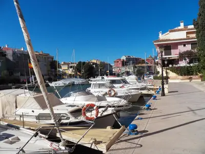 a group of boats docked in a harbor at Valencia Port Saplaya in Port Saplaya