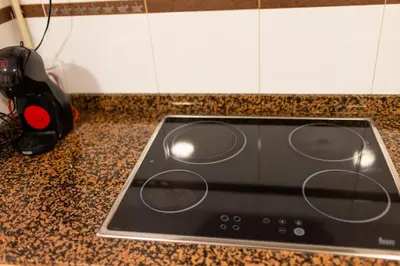 a stove top oven sitting on top of a counter at Medinaceli airco, wifi and free parking in Valencia