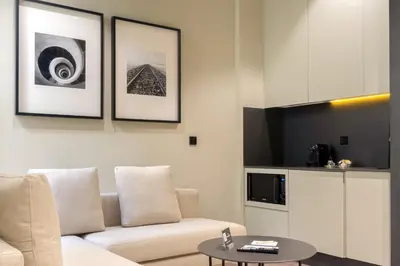 a living room with a couch and a table at The Valentia Cabillers in Valencia