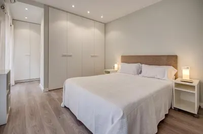 a living room with a couch and a glass table at Beds & Breaks Casals in Valencia