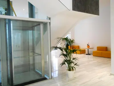 a glass door in a room with a plant at Flats Friends Soho Suites in Valencia