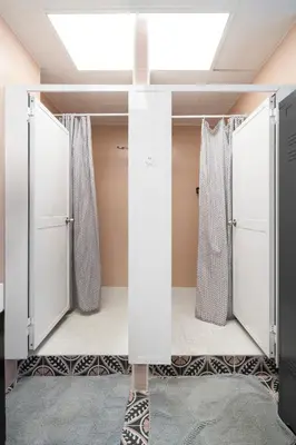 a room with white doors and a skylight at Home Youth Hostel by Feetup Hostels in Valencia