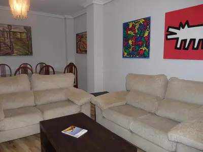 a living room with two couches and a table at Apartment Savoy in Valencia
