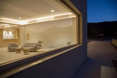a view of a living room through a window at Mar de Fulles in Alfondeguilla