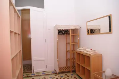 a room with a closet with shelves and a mirror at Carlos & Ana Amplio Apartamento 4 Habitaciones Centro Valencia in Valencia