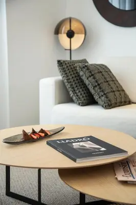 a coffee table with a plate on top of it at MYR Marqués House in Valencia