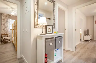 a bathroom with a vanity and a mirror at Apartamento Alta in Valencia