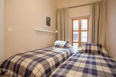 two beds sitting next to each other in a room at Apartamento Fos in Valencia