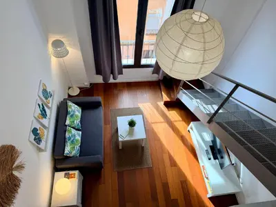 an overhead view of a living room with a table at Petit Palomar - PalomarGroup in Valencia