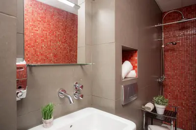 a bathroom with a sink and a shower at Apartment Collado in Valencia