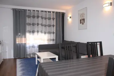 a living room with a couch and a table at Apartamento Ribes Valencia in Valencia