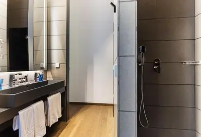 a bathroom with a sink and a shower at One Shot Mercat in Valencia