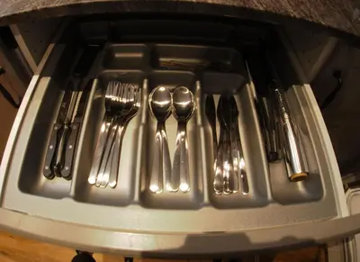 a tray of utensils sitting on top of a table at Valencian Apartment in Valencia