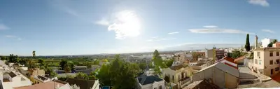 a view of a city with buildings and trees at Hostal Mitre Paterna in Paterna
