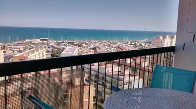 a view of a city from a balcony at Marenostrum view in Playa Pobla de Farnals