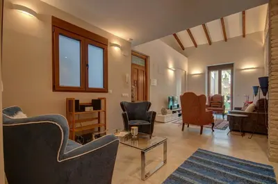 a living room with chairs and a table at Beds & Breaks Verdi 2 in Valencia