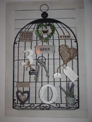 a picture of a bird cage with items in it at Valencia what else... in Valencia