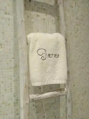 a towel on a towel rack in a shower at Dalt Vila in Eslida