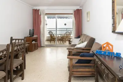 a living room with a couch and a table at Florazar 1, Iii-A 18-C in Cullera