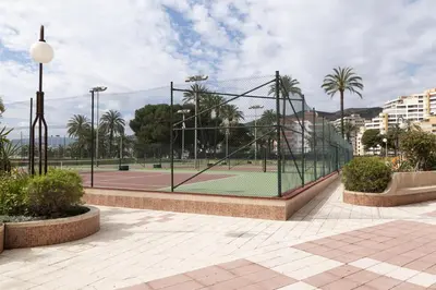 a tennis court with a net on a tennis court at Florazar 2, Ix-7-B in Cullera