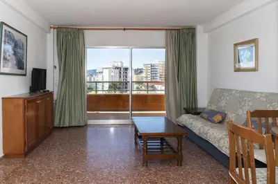 a living room with a couch and a table at Florazar 2, Vi-7-C in Cullera
