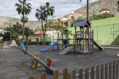a playground with slides and a play structure at Florazar 2, Vii-2-A in Faro de Cullera