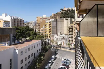 a view of a city street with buildings at Mar Y Montaña 7º-119 in Cullera
