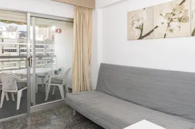 a living room with a couch and a table at Prado, A-7º-72 in Cullera