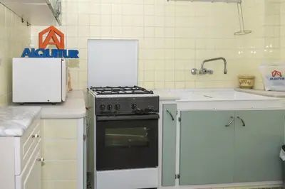 a kitchen with a stove and a sink at Provence, 7º-25 in Cullera