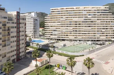 an aerial view of a large building with a tennis court at Santa Marta, I-A 7º-19 in Cullera