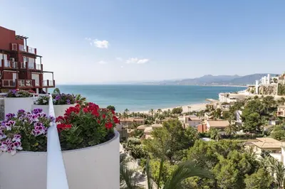a view of the beach from the balcony of a building at Villas Cap Blanc Ii, Pta 11 in Cullera
