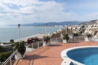 a view of the ocean from the balcony of a villa at Villas Cap Blanc, 1-31 Cab I-36 in Cullera