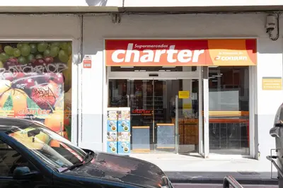 a car parked in front of a store at FLORIT FLATS - Ruzafa Attic with Private Terrace in Valencia