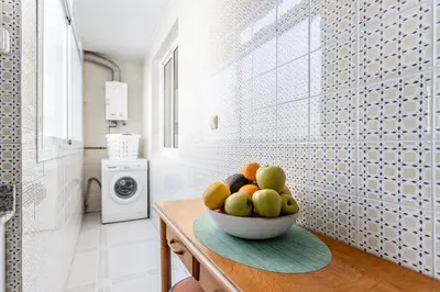 a bowl of fruit on a table in a bathroom at Casa Victoria in Valencia