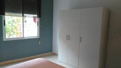 a room with a white cabinet and a window at Apartamento Ciudad de las Ciencias 2 in Valencia