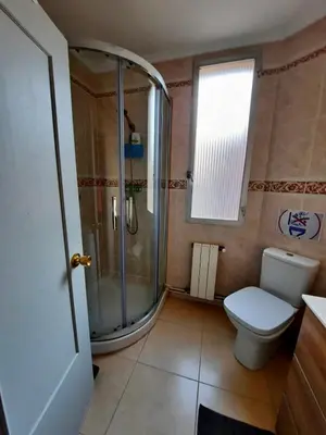 a bathroom with a shower and a toilet at Piso en la playa in Valencia