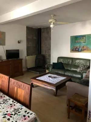 a living room with a couch and a coffee table at Casa Las Violetas in Altura