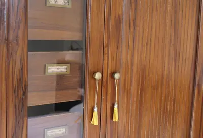 a wooden door with yellow tassels on it at Apartamento Con Vistas Espectaculares in Valencia