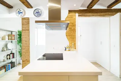 a kitchen with a white counter and a sink at Vivaldi Center City in Valencia