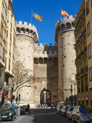 a large castle with two flags on top of it at Vivaldi Center City in Valencia