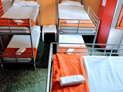 a group of bunk beds in a room at Feetup Home Backpackers Valencia in Valencia