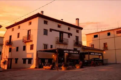 a large white building with a restaurant in front of it at Hotel Restaurante Doña Anita in Requena
