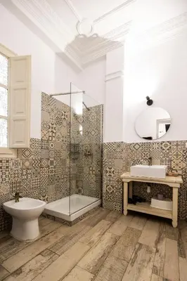 a bathroom with a shower and a toilet and a sink at Live in Chianti Apartaments by Concept Flats in Valencia