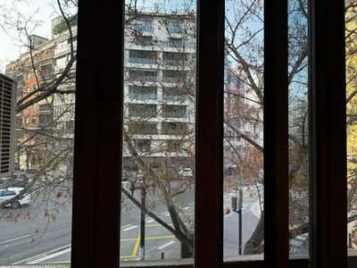 a view of a city street with a tall building at Russafa Codrut in Valencia