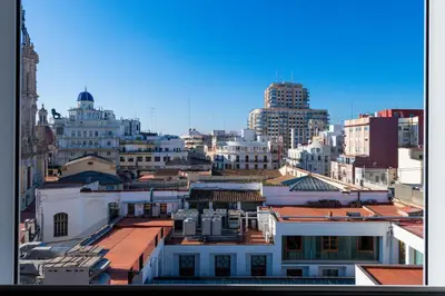 a view of a city skyline with buildings at Ayuntamiento Panoramic in Valencia