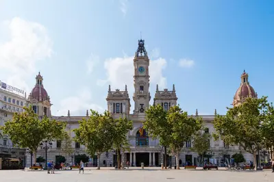 a large building with a clock tower on top of it at Ayuntamiento Panoramic in Valencia