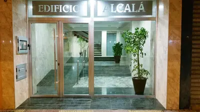 an entrance to an office building with a glass door at 