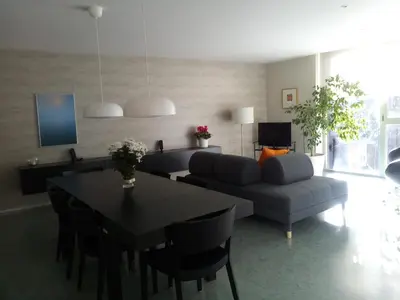 a living room with a couch and a table at Apartamento Forn dels Apòstols in Valencia