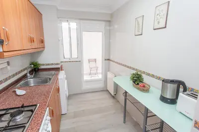 a kitchen with a sink and a counter top at VLC - Cisneros in Valencia